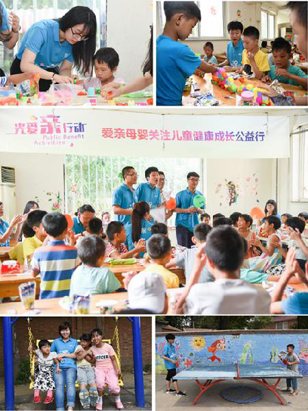 爱亲工作人员与光爱学校孩子们亲密互动